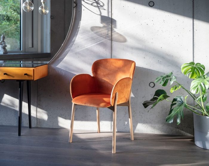 A furniture design studio ad for 'Ginger' - a new armchair design - has sparked controversy online for appearing to include a racist term.