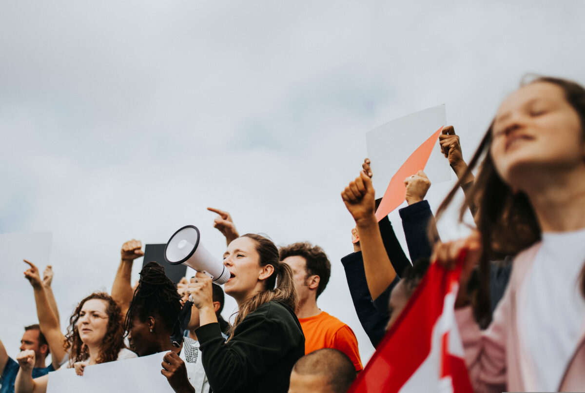 The Conscious Advertising Network (CAN) denies promoting 'cancel culture' and clarifies its stance on political ad boycotts following claims by Conservative MPs (the photo depicts people protesting).