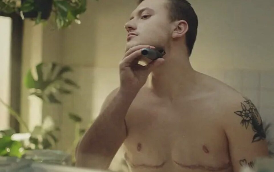 Braun has been labelled 'irresponsible' and 'immoral' by critics in a backlash against the brand using trans model with surgical scars in an advert for men's trimmers, depicted here