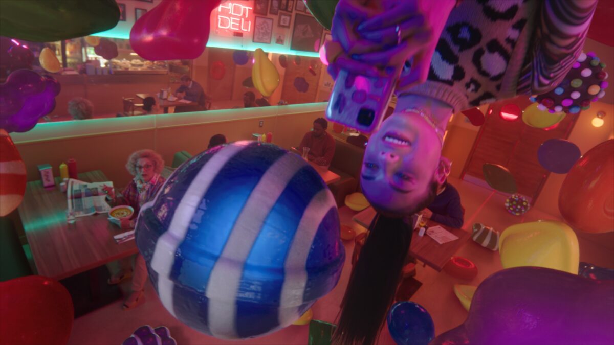 King's Candy Crush Saga is bursting out of phones and into the real world with immersive films putting players at the heart of its new BBH campaign, a still from the ad depicted here