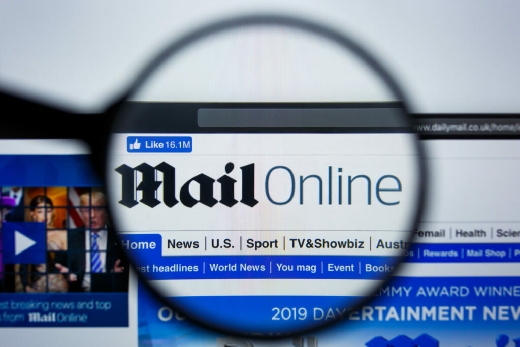 DMGT's ad business Mail Metro Media is boasting that it has collected enough data about its readers to not be affected by the end of cookies, here depicting Mail Online front page, through a magnifying glass