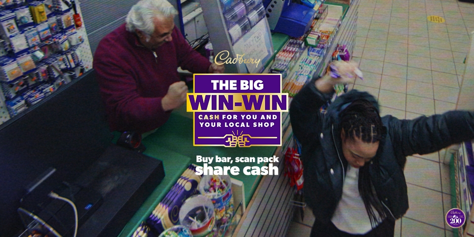 Image shows a still from the new campaign. A girl is dancing and a shopkeeper celebrates as they both win a cash prize. Cadbury is partnering with its agency of record VCCP to relaunch its integrated "The Big Win Win", which spotlights local shops, for the second consecutive year.