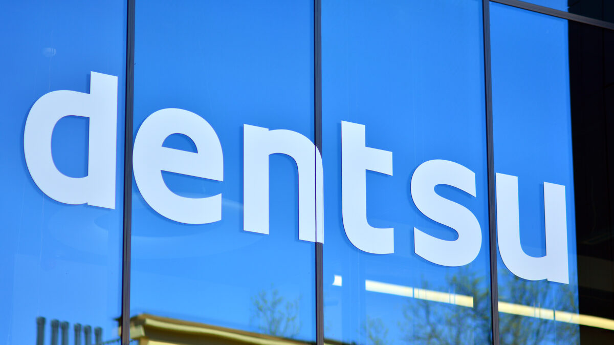Dentsu building from the outside. Dentsu has returned to subtle growth in its Q2 earnings results, with a 0.2% year-on-year uplift in organic revenue, the group largely attributed this to its One Dentsu Strategy.