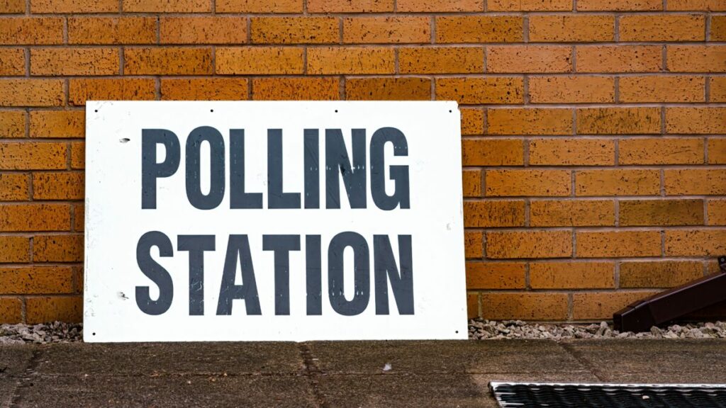 Polling station sign on a brick wall. More people feel that brands shouldn't be involved in politics (41%) than that they should (28%), according to Havas Media Network's 'Year of Elections' survey.