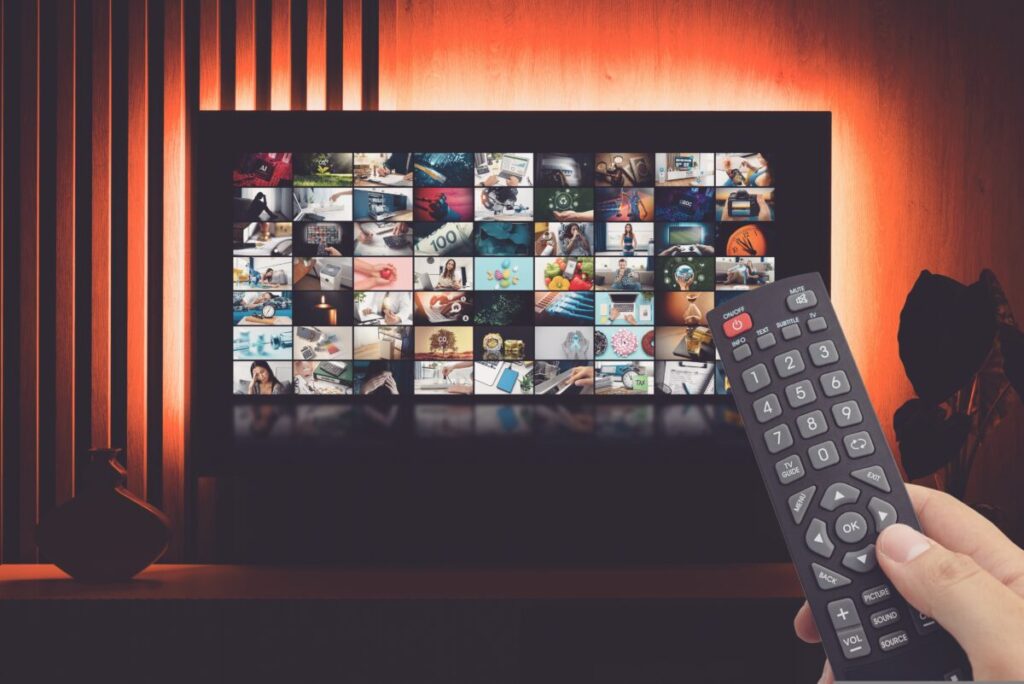 Remote pointed at television screen with an array of subscription VOD svices to choose from. Some 20 million UK homes (68%) have access to some form of subscription video-on-demand (VOD) service in Q2 2024 according to data from Barb's 'Establishment Survey'.