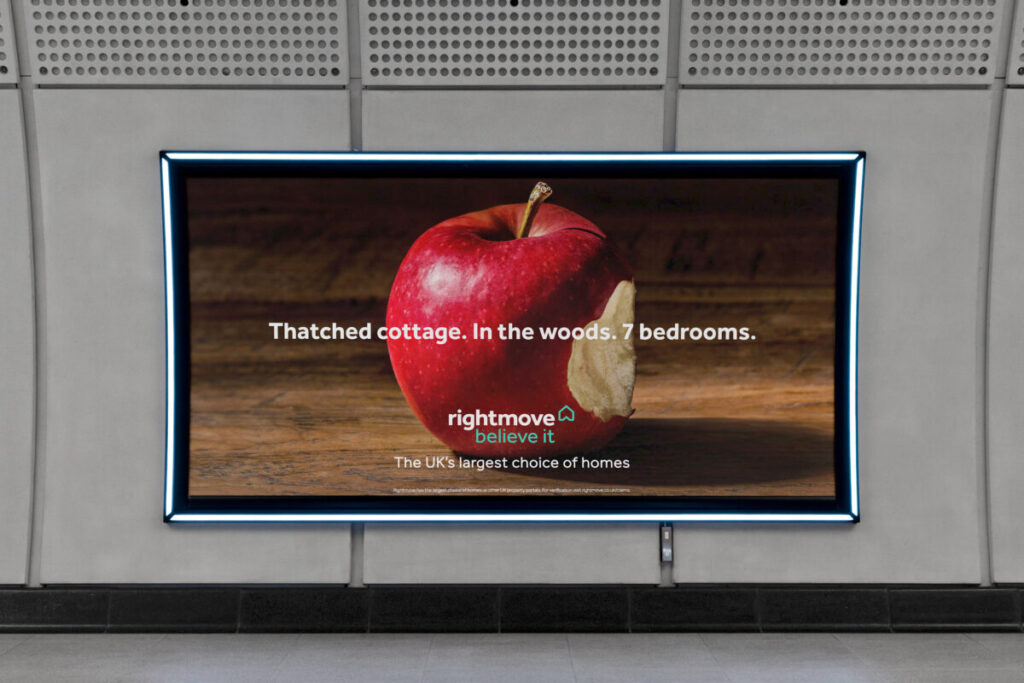 Right Move billboard shows an image of an apple with the phrase "Thatched cottage, in the worrds. 7 bedrooms". The new messaging builds on Rightmove's recent announcement as headline sponsor of The Voice UK and the business's self-believe messaging.