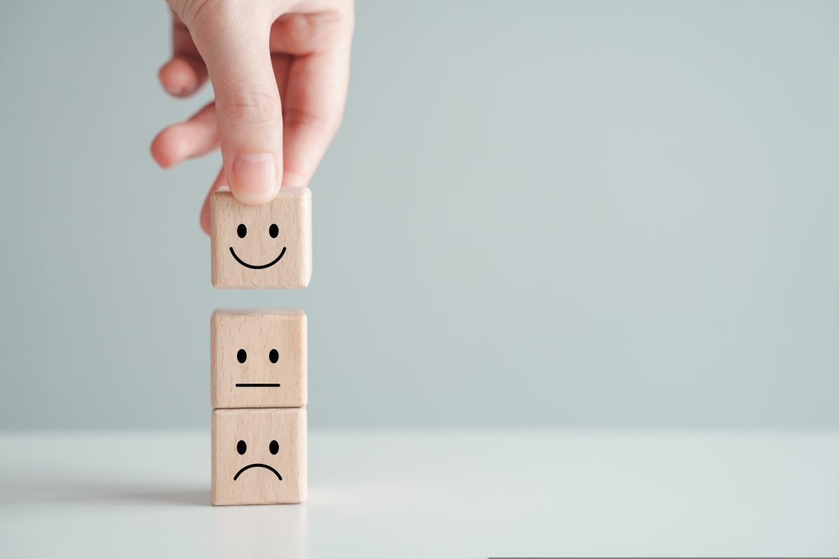 A hand lifts up a positive brick from a straight-faced and sad brick. Havas' new report identifies a trend towards resilience and optimism among consumers across 24 markets and more than 2,600 brands.