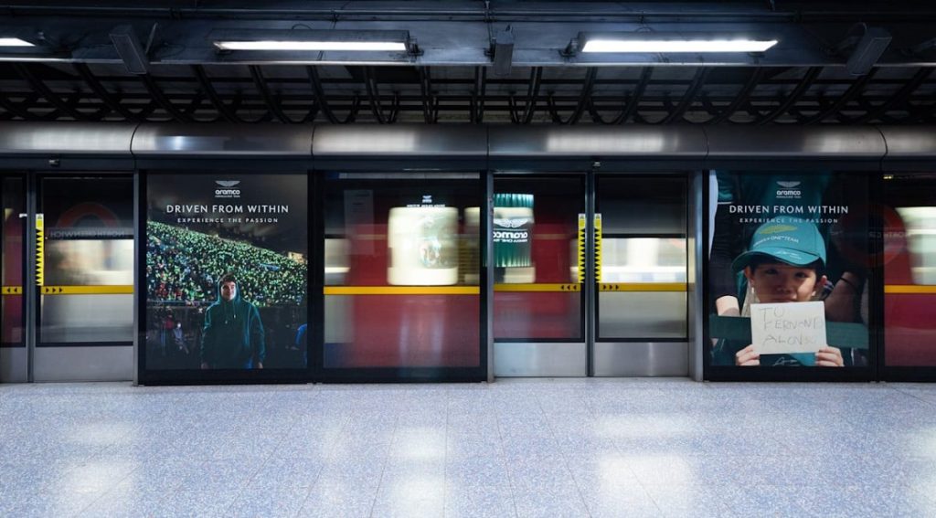 Aston Martin Aramco paints North Greenwich Tube station green